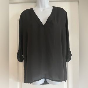 Express flows black blouse. Size medium. Great condition.